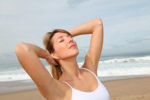 Woman basking in sunlight