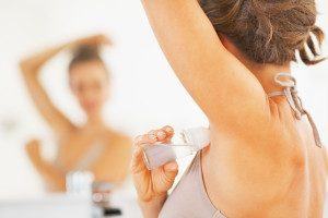 Woman drying her armpits