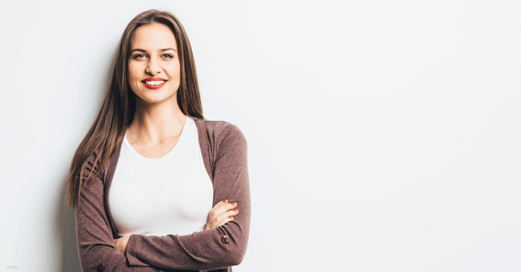 A woman smiling