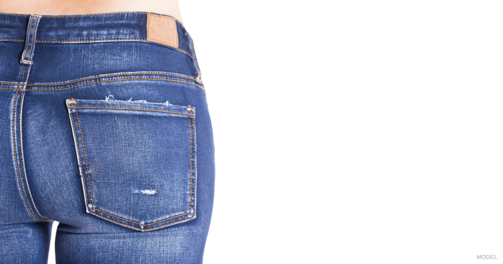 close up of gluteus in blue jeans.